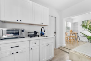Fridge, microwave, coffee/tea maker, electric kettle