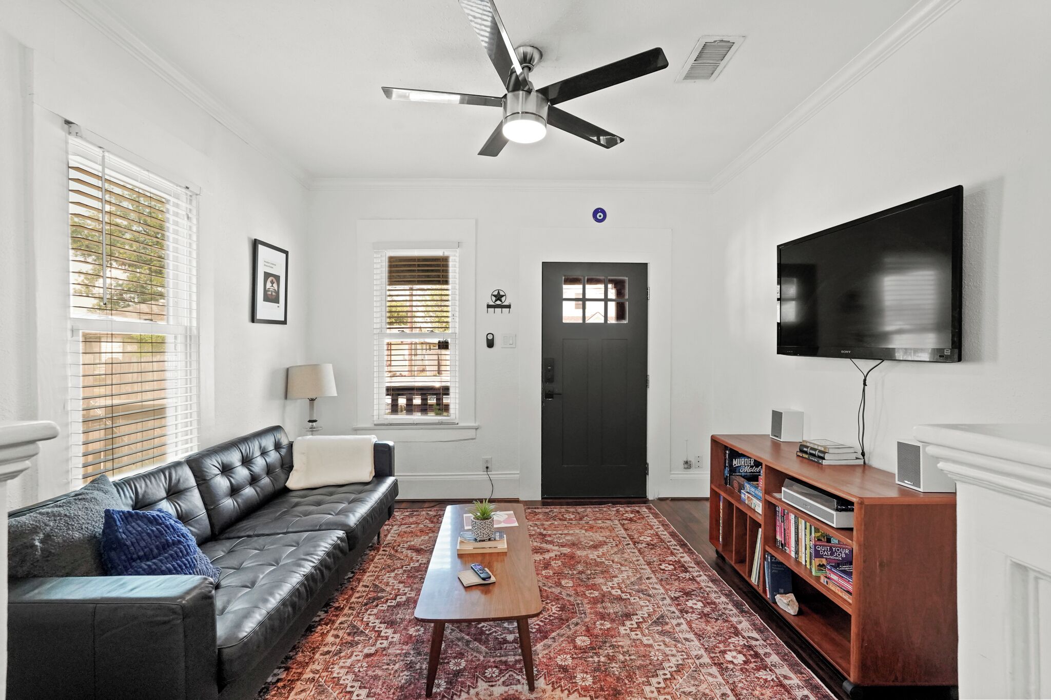 Smart TV, fireplace, books, music library