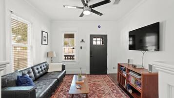 Smart TV, fireplace, books, music library