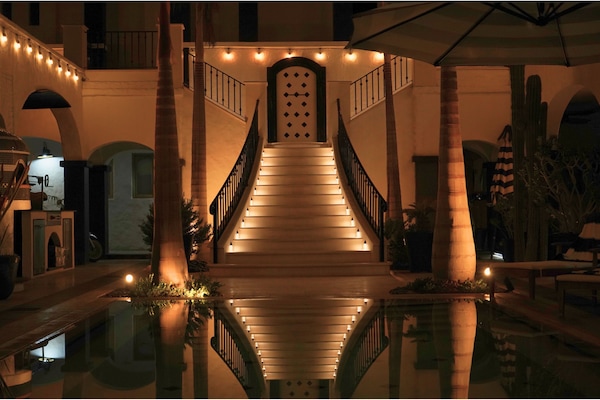 Outdoor pool, open 8:00 AM to midnight, pool umbrellas, pool loungers