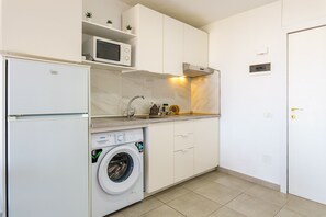 Fridge, microwave, coffee/tea maker, electric kettle