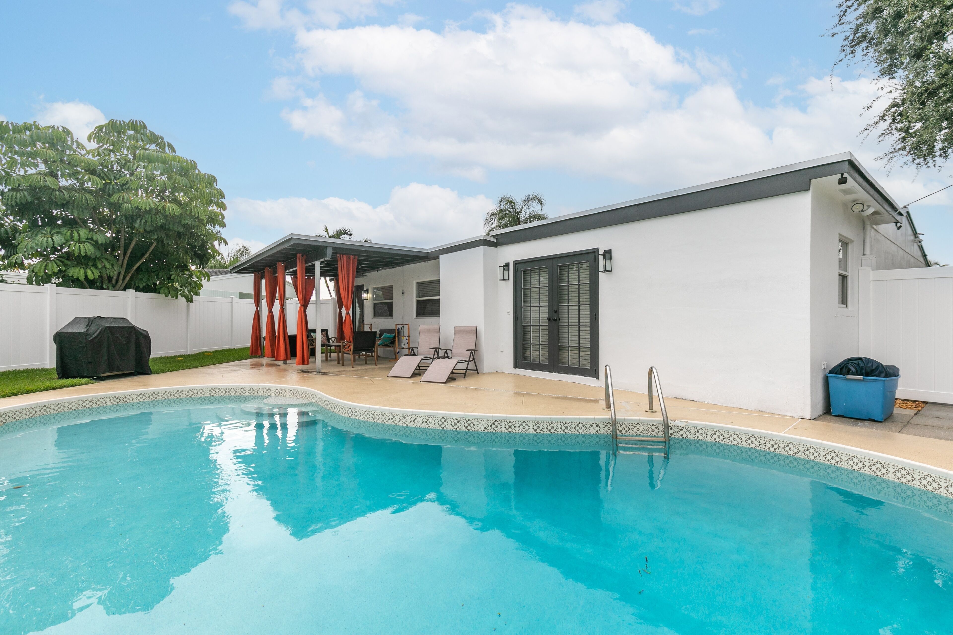 NEW LISTING! Palm Beach Bliss w/ Pool l Large Backyard l Grill by RedAwning