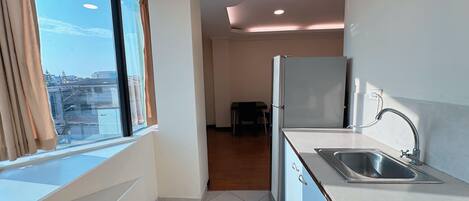 Microwave, coffee/tea maker, cookware/dishes/utensils