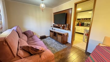 Superior Chalet, City View | Living area | Flat-screen TV