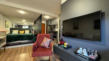 Luxury Apartment, Balcony, City View | Living area | 50-inch flat-screen TV with digital channels, TV, Netflix