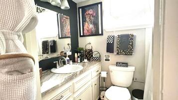 Hair dryer, towels, soap, shampoo