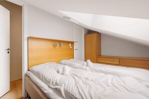 2 habitaciones, tabla de planchar con plancha, cuna de viaje y wifi