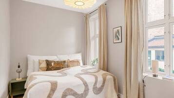 2 dormitorios, tabla de planchar con plancha, wifi y ropa de cama