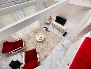 Deluxe-Chalet | Wohnbereich | Flachbildfernseher