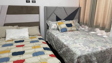 2 habitaciones, tabla de planchar con plancha, wifi y ropa de cama