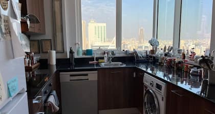 Charming tower with 1 bedroom, WiFi, Gym, pool in the Middle of the City