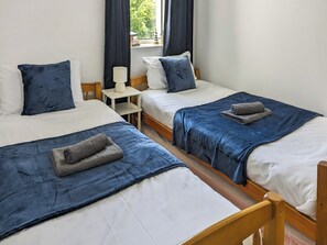 3 quartos, Wi-Fi de cortesia, roupa de cama