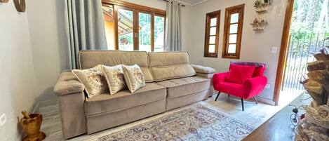 Premium House | Living area | 50-inch LCD TV with digital channels, Netflix, streaming services