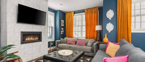 Smart TV, fireplace, books