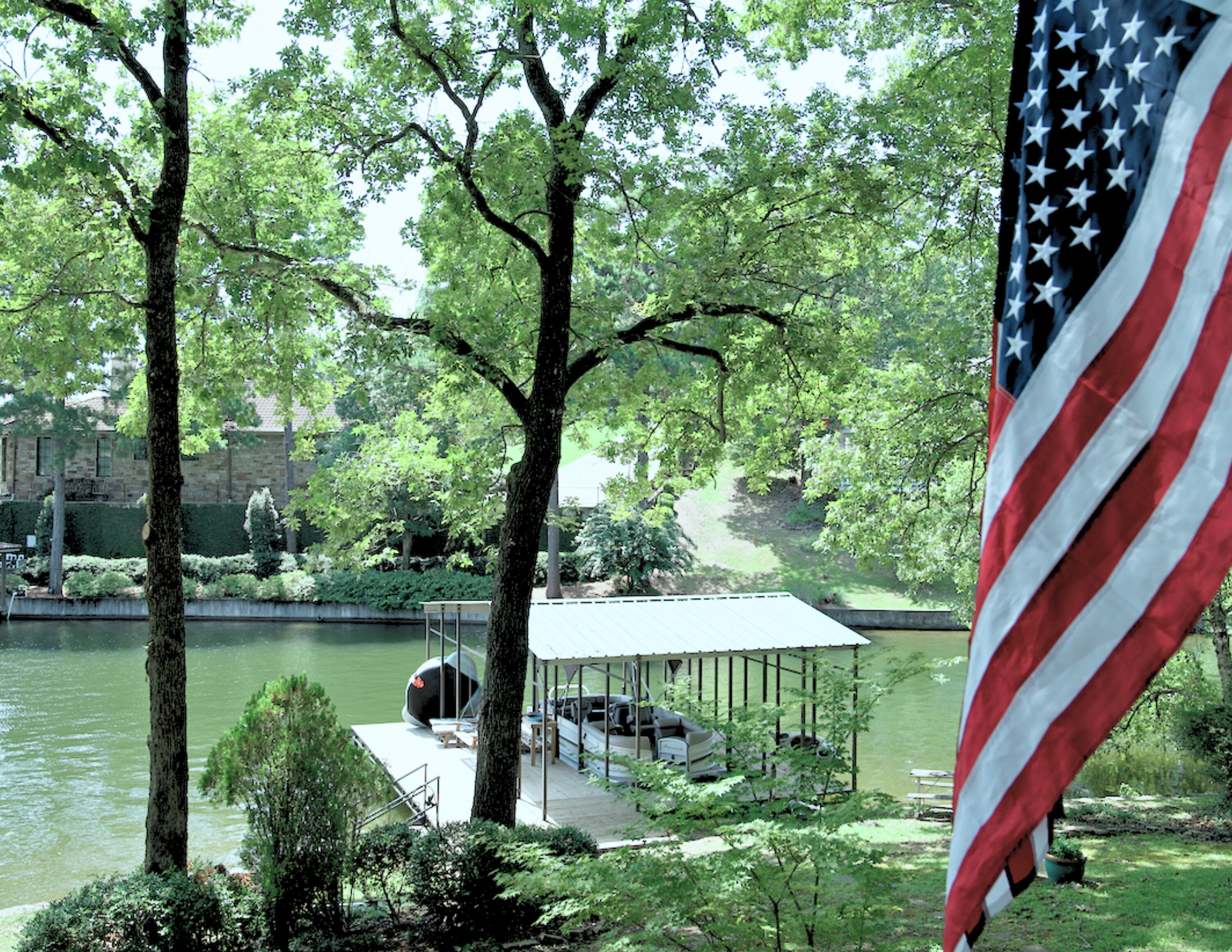 Americana meets cape cod style lake front home with dock and boat available!