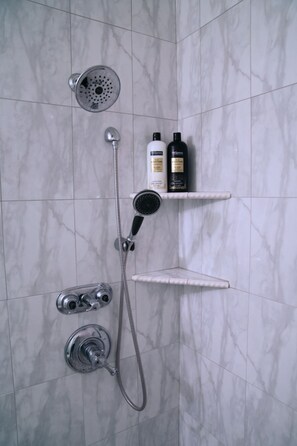 Shower, hair dryer, towels, soap