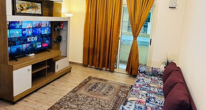 Cozy 2-bedroom apartment in charming Sharjah with AC