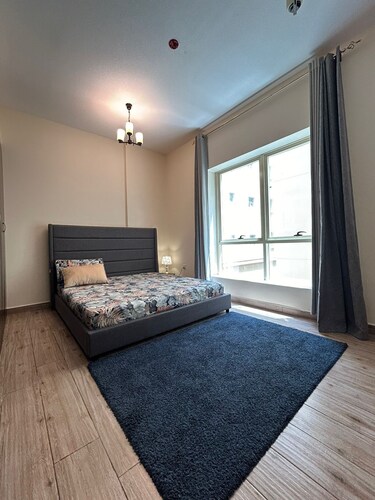 Cozy 2-bedroom apartment in charming Sharjah with AC