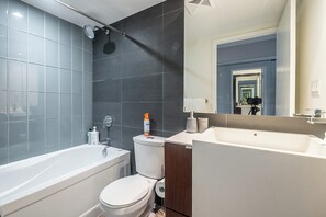Shower, hair dryer, towels, soap