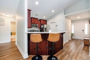 Fridge, microwave, oven, stovetop - Modern Single Story Home (Madison)