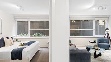 1 bedroom, desk, iron/ironing board, travel cot