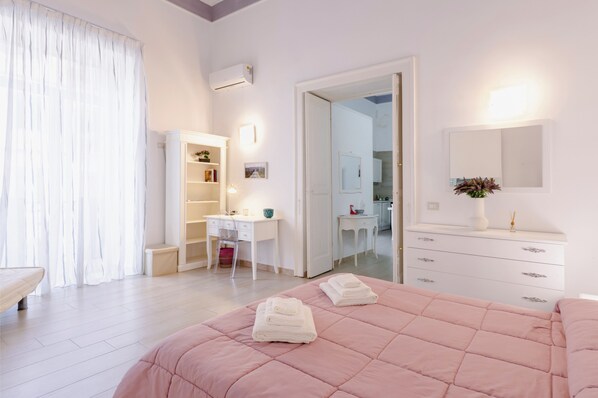 1 bedroom, desk, iron/ironing board, travel crib