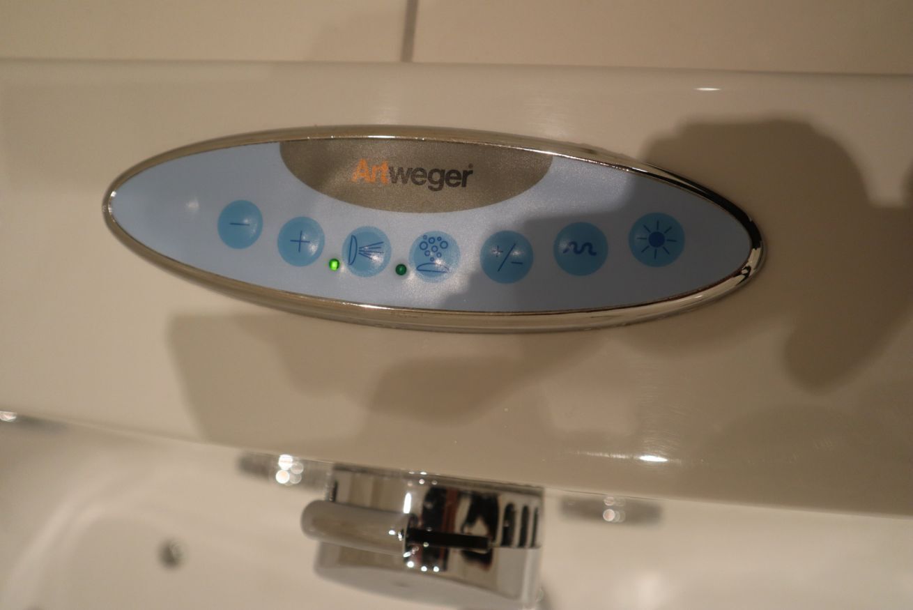 A control panel with the brand name 'Antweger' and several buttons.