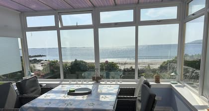 Unique house in an idyllic situation on a beach