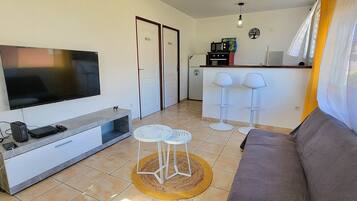 Appartement | Coin séjour | Télévision à écran plat