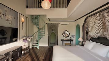 Family Suite Garden View | Living area | 50-inch Smart TV with digital channels
