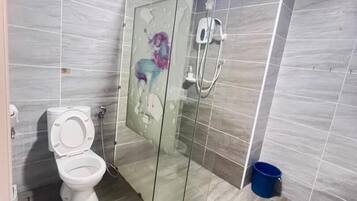 Suíte estúdio família | Banheiro