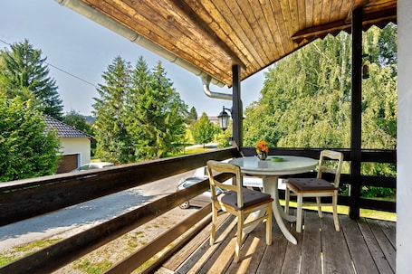 Outdoor dining. Holiday Apartment 'Welcome to Ferienhaus Europahof' with Garden, Balcony and Wi-Fi
