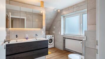 Shower, hair dryer, towels