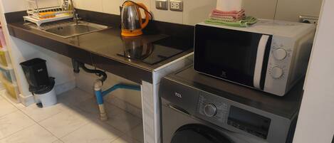 Fridge, microwave, toaster, cookware/dishes/utensils