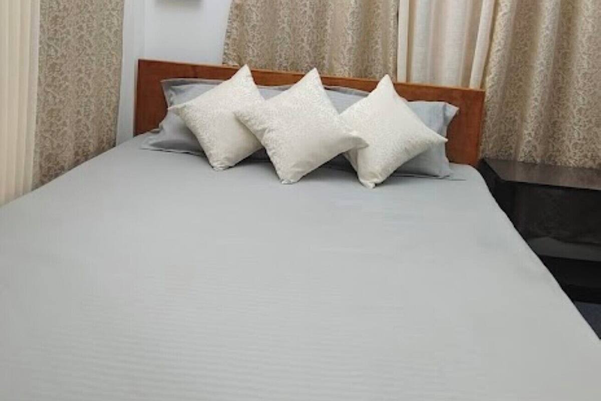 Habitación cuádruple Deluxe | Wifi gratis y ropa de cama