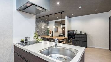 Full-sized fridge, espresso maker, coffee/tea maker, electric kettle