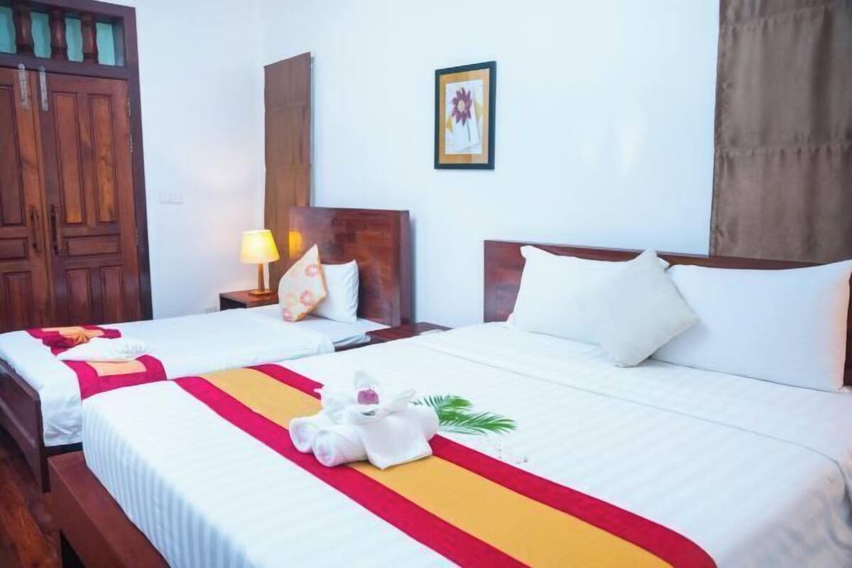 2 quartos, roupas de cama premium, espaço de trabalho para notebook