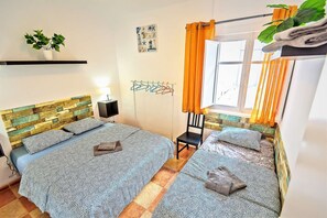 4 dormitorios, tabla de planchar con plancha, wifi y ropa de cama