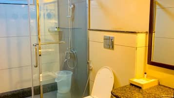 Shower, rainfall showerhead, towels, soap