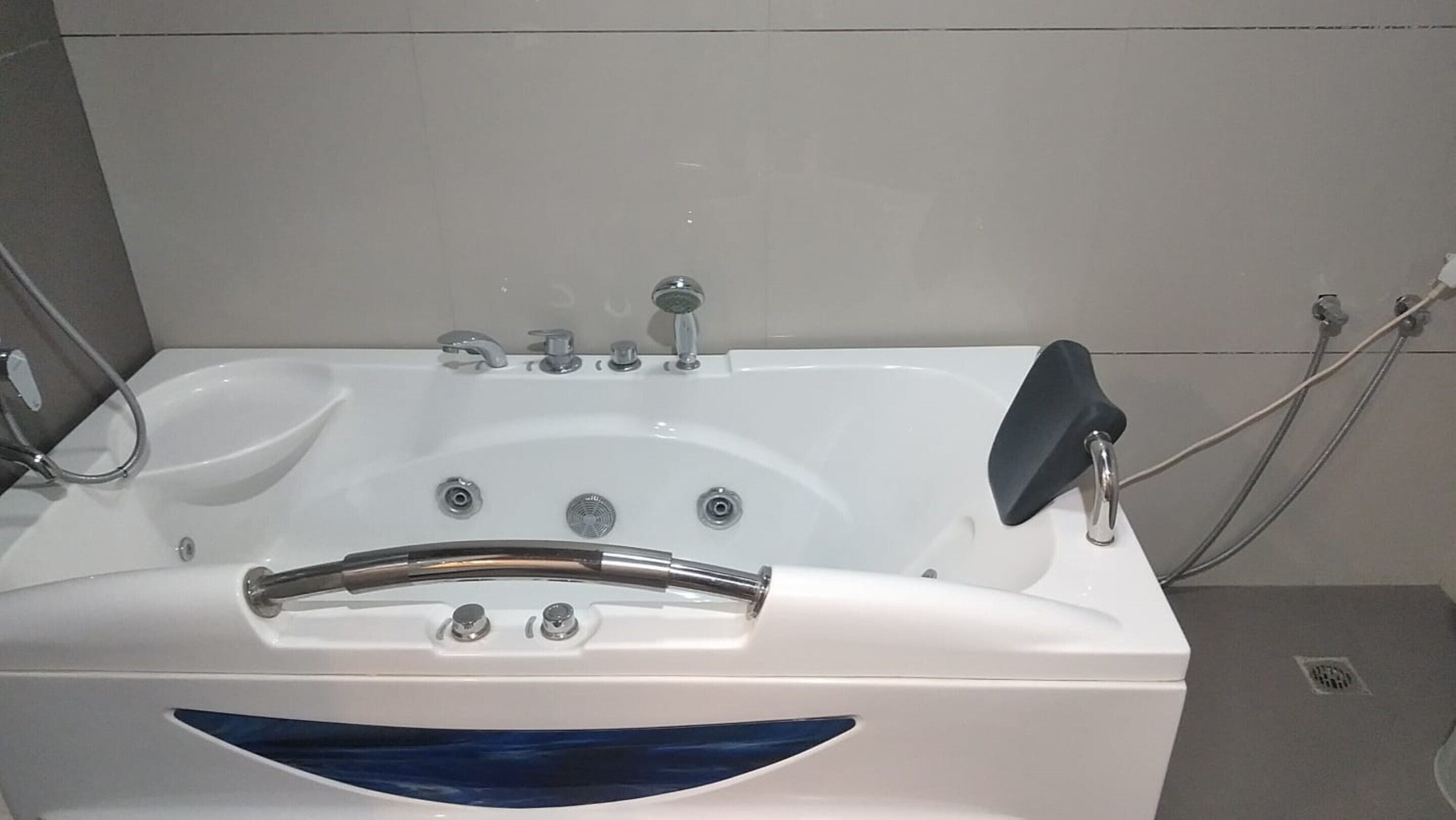 Shower, rainfall showerhead, towels, soap