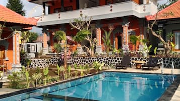 Outdoor pool, open 7:30 AM to 9:00 PM, pool loungers