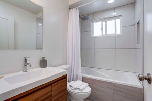 Shower, hair dryer, towels