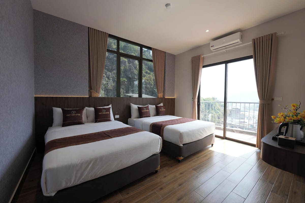 Memory-foam beds, in-room safe, laptop workspace, blackout curtains