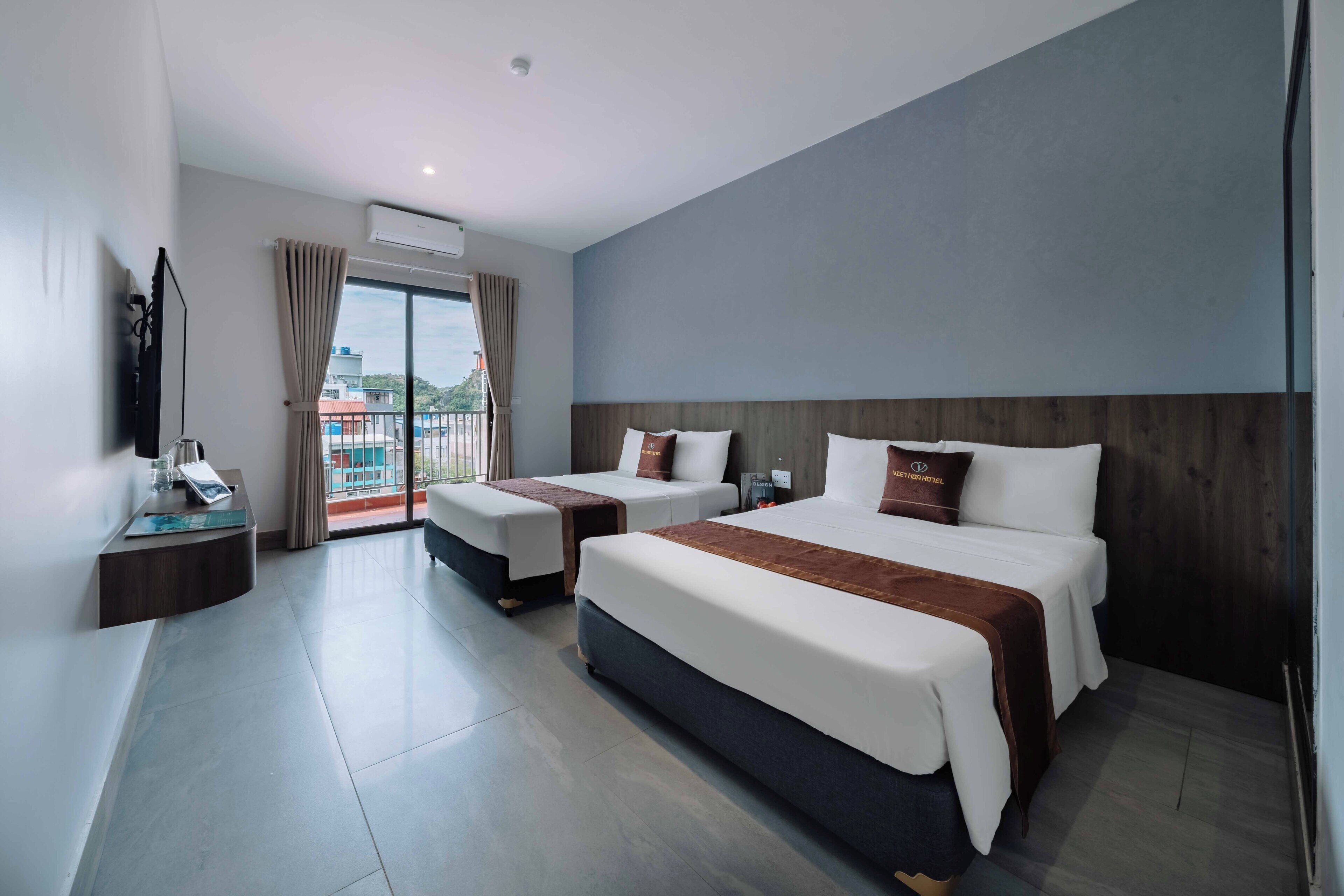 Deluxe Twin Room, Non Smoking, Balcony | Memory foam beds, in-room safe, laptop workspace, blackout drapes