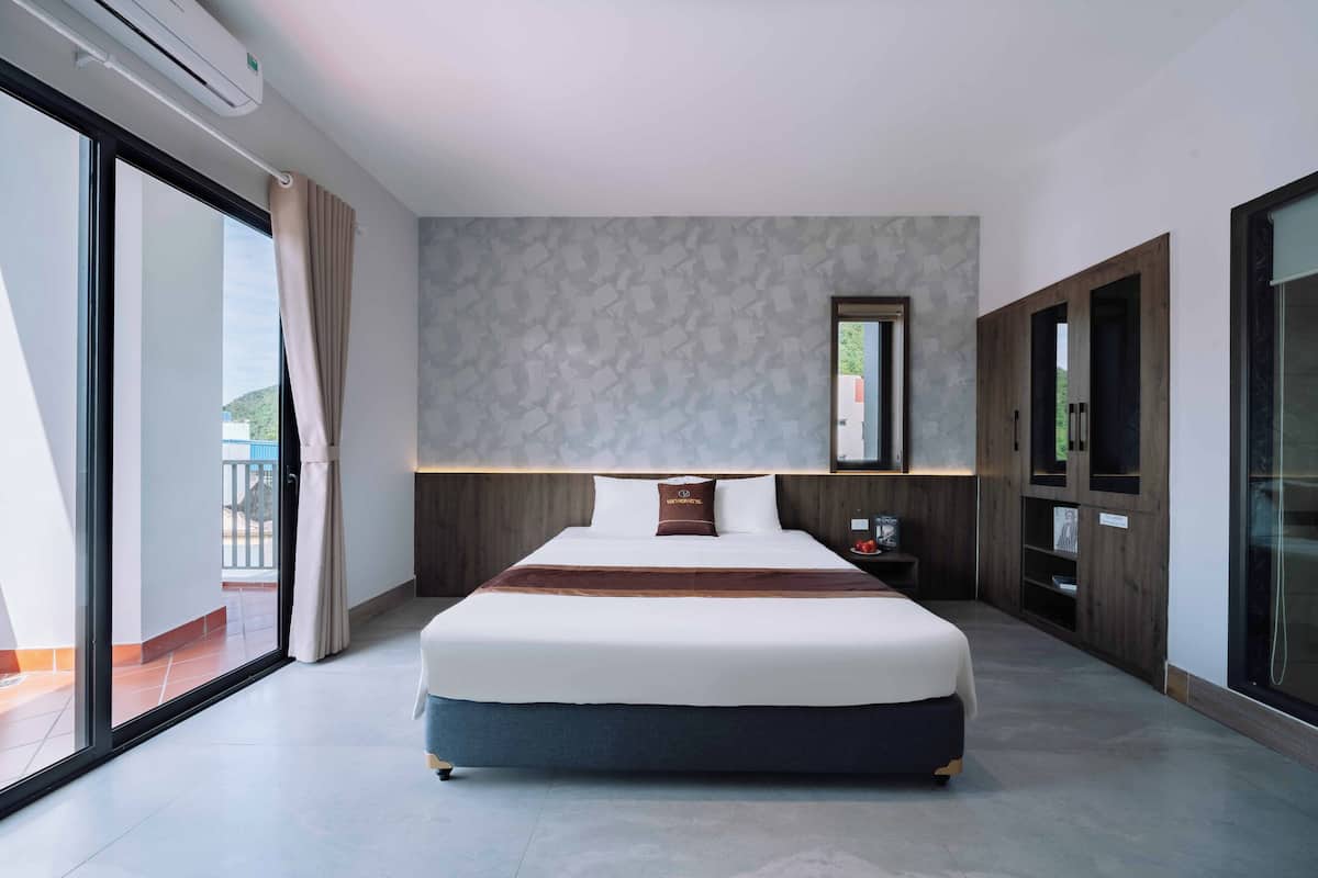 Chambre Double Deluxe, 1 très grand lit, balcon | Matelas mémoire de forme, coffres-forts dans les chambres