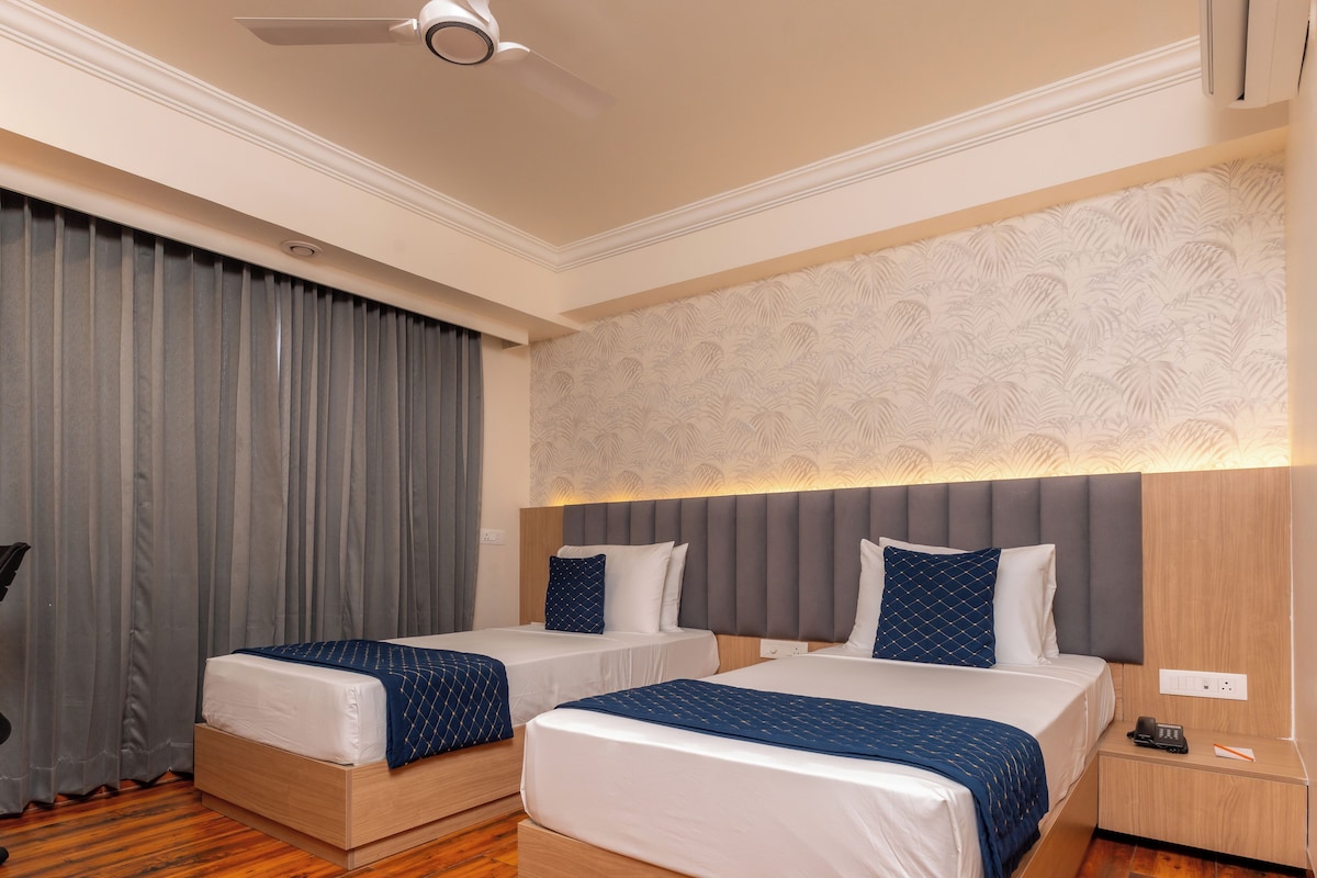 Deluxe Double or Twin Room | Down comforters, memory foam beds, in-room safe, desk