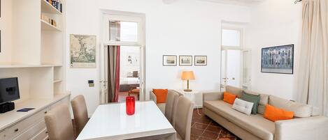 Deluxe Apartment | Living room | 40-inch LED TV with digital channels