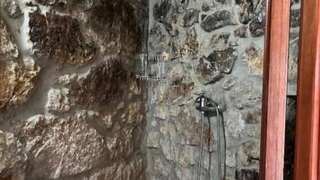 Shower, rainfall showerhead, hair dryer, towels