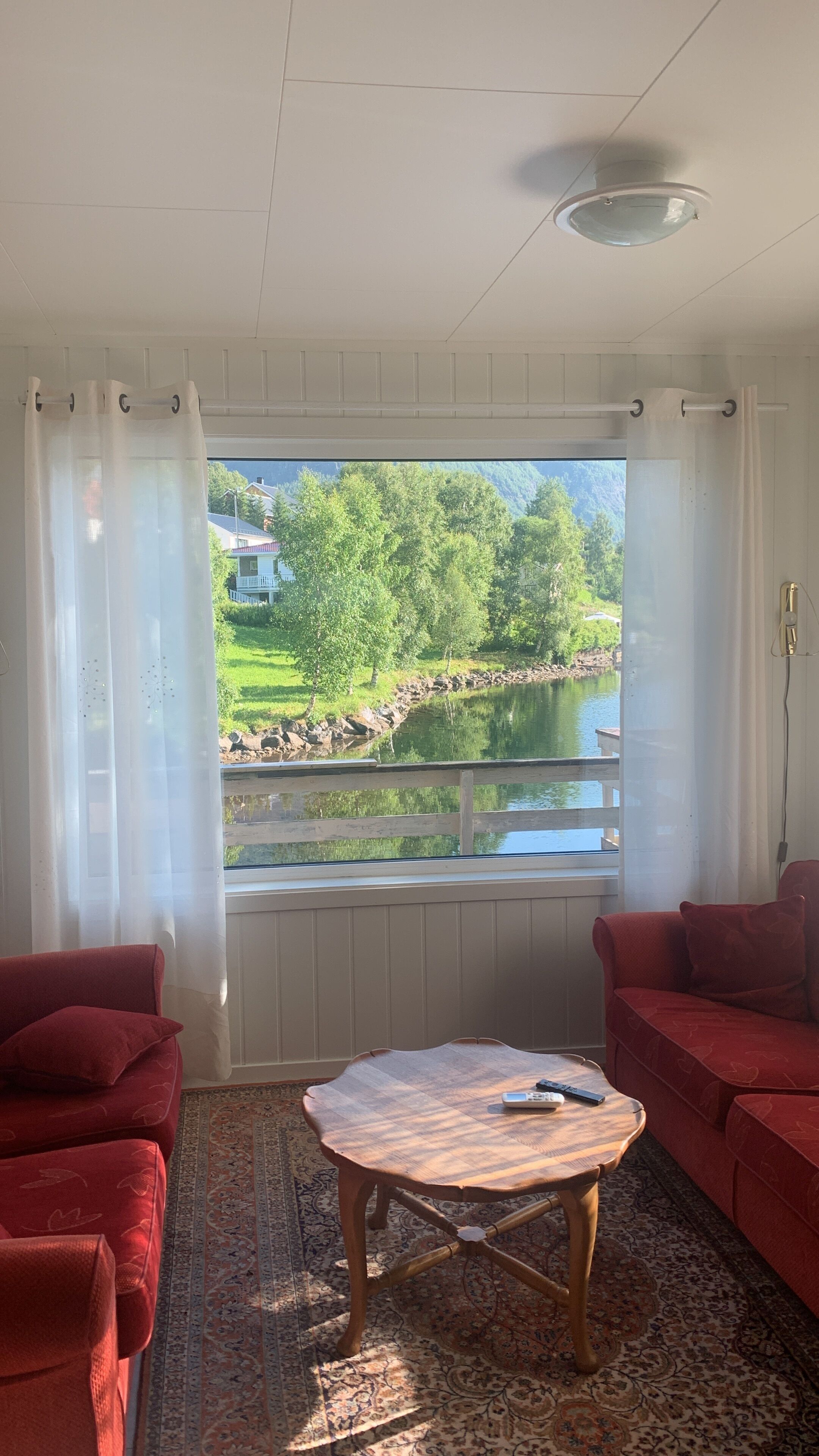 Ground Floor Apartment | Living area | Flat-screen TV