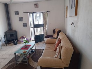 House | Living area | TV, fireplace